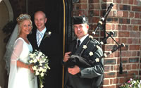 Wedding Couple with Scottish Piper